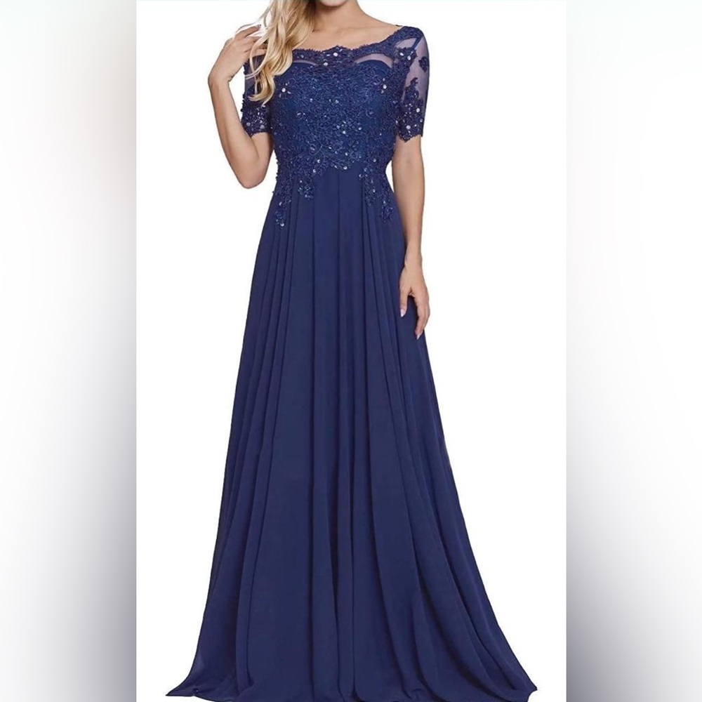 Women’s size 14 navy blue evening gown. Never worn